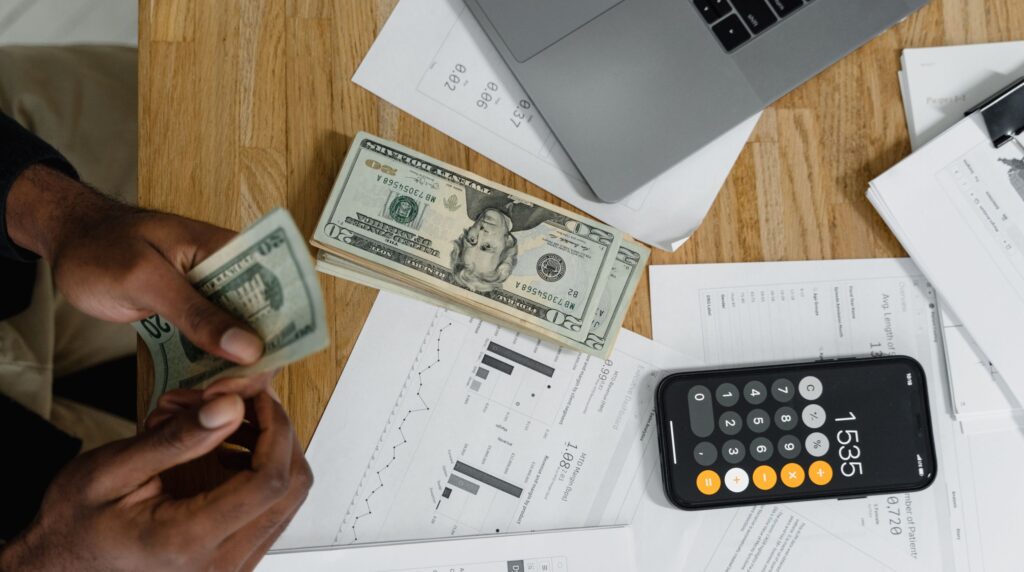 Recruitment operations director comparing software costs per seat in a spreadsheet
