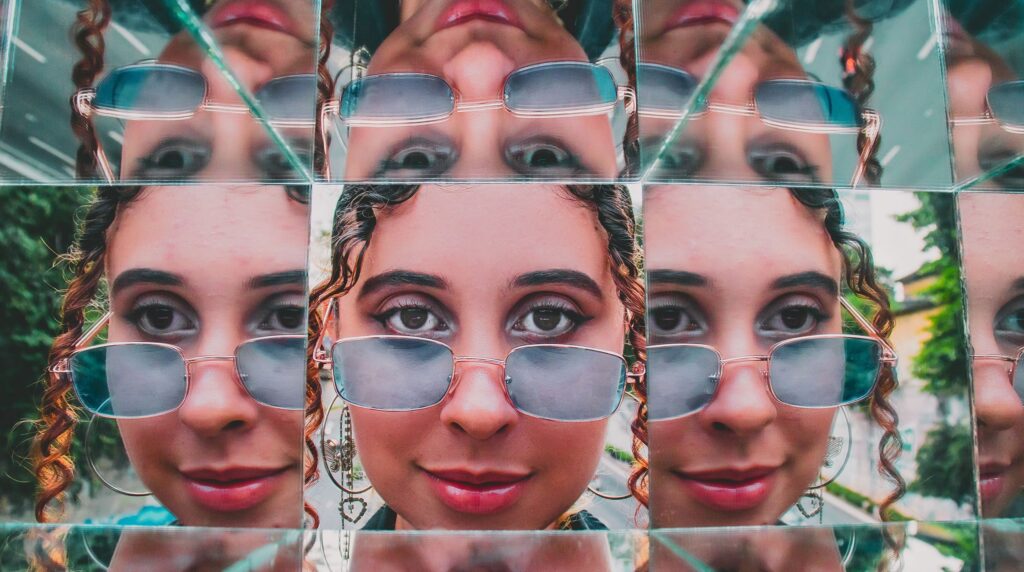 A single person reflected twice, illustrating one candidate split across two CRM records